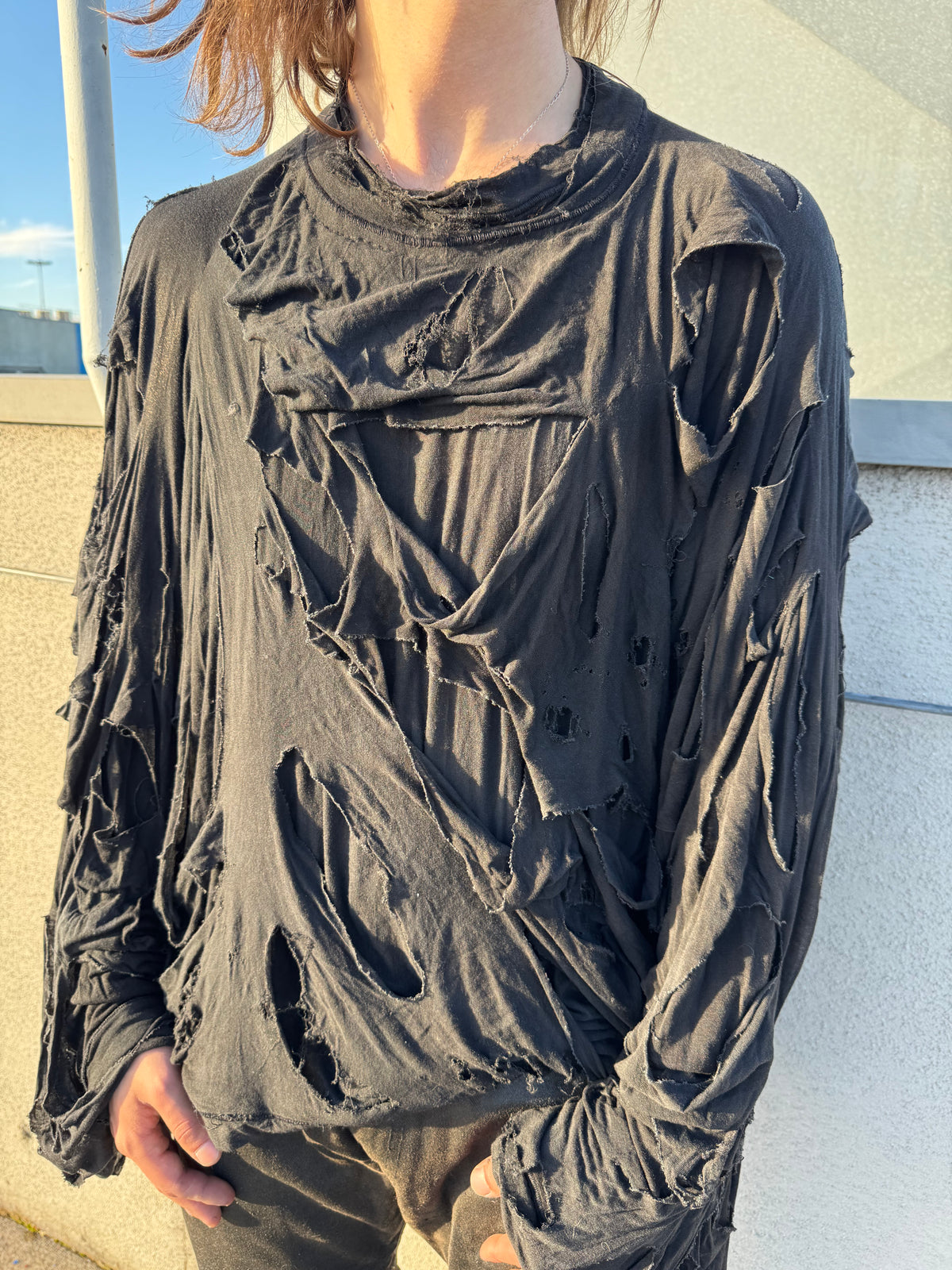 [40] runway distressed longsleeve